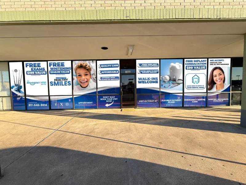 Design mockup of a dental clinic storefront covered in printed window graphics