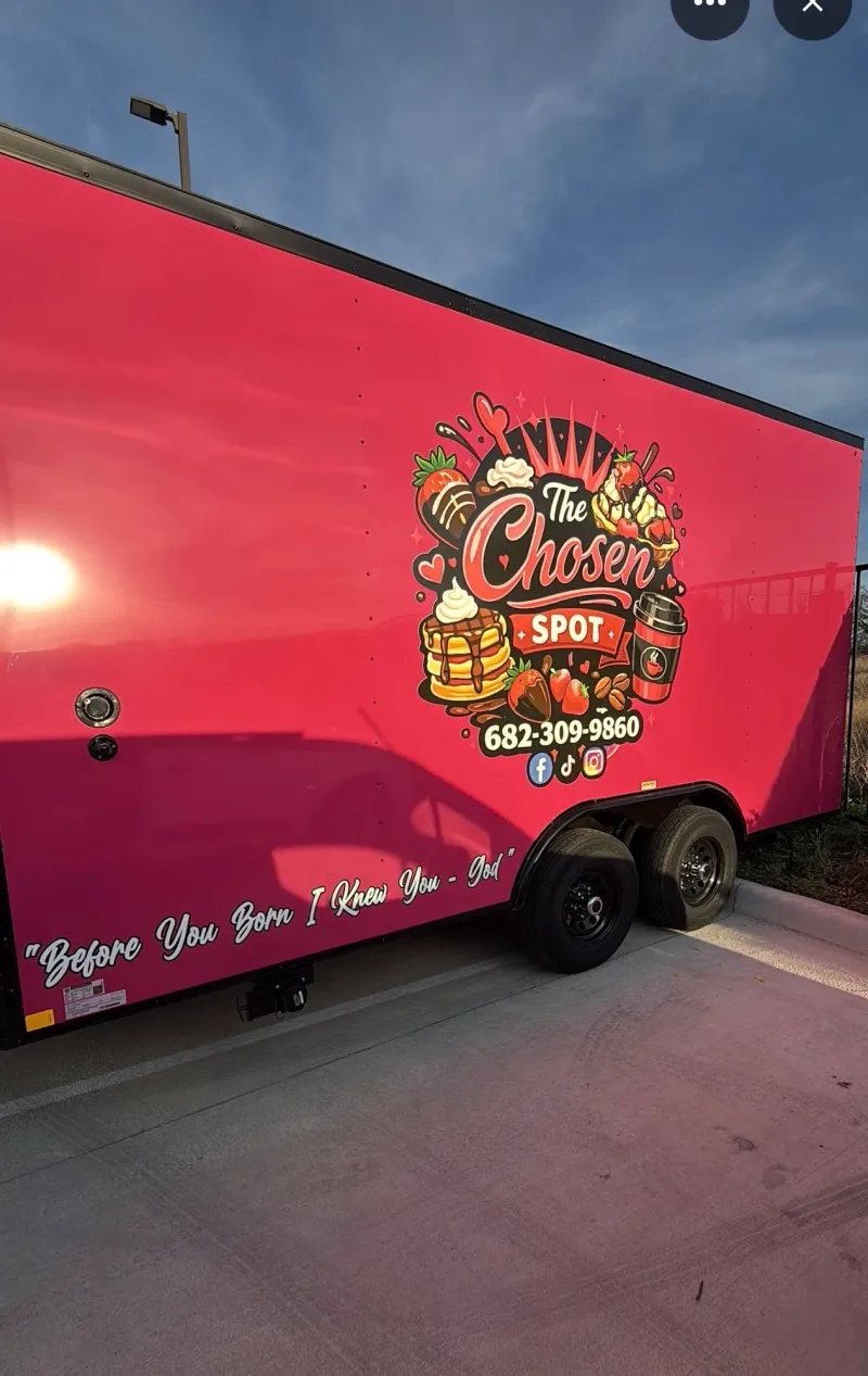 Concession trailer fully wrapped in red with The Chosen Spot dessert logo
